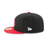 Black and red fitted sports cap with flat brim and embroidered logo on the side