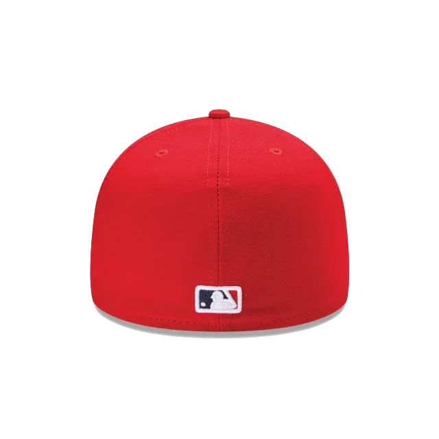 Red fitted baseball cap with MLB logo on the back, sports hat on white background