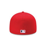 Red fitted baseball cap with MLB logo on the back, sports hat on white background