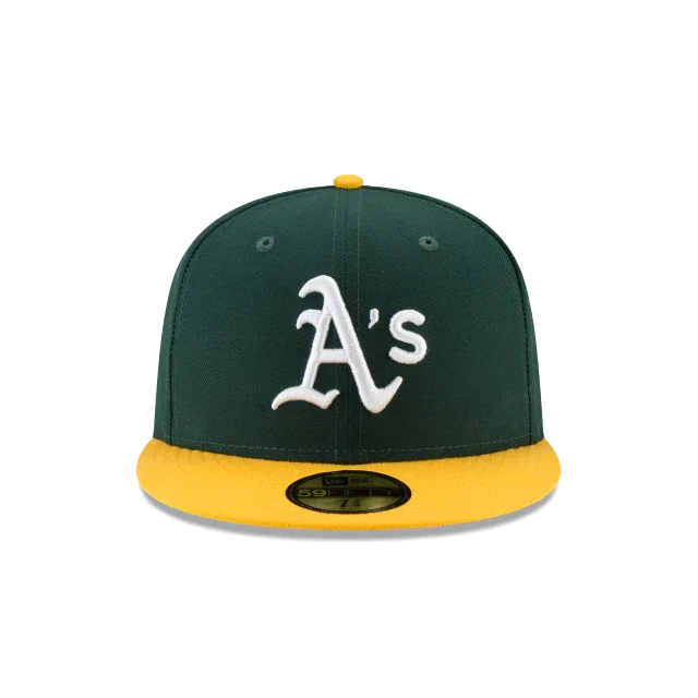 Green and yellow fitted baseball cap with white A's logo, flat brim, sports hat