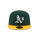 Green and yellow fitted baseball cap with white A's logo, flat brim, sports hat