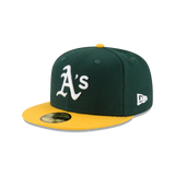 Green and yellow fitted cap with embroidered A's logo, flat brim, classic baseball hat style