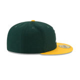 Green and yellow fitted sports cap with flat brim, side view on white background