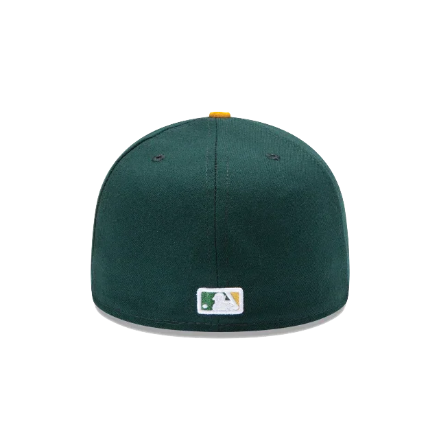 Dark green fitted baseball cap rear view with MLB logo patch and yellow top button