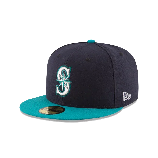 Navy blue and teal baseball cap with front embroidered sports logo and flat brim