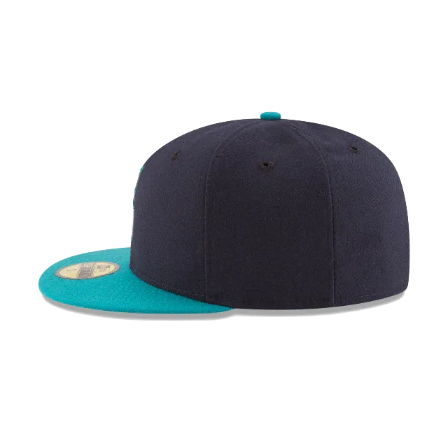 Black fitted sports cap with teal flat brim, side view on white background
