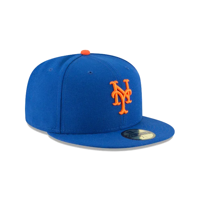 Blue New York Mets fitted cap with orange embroidered logo and flat brim