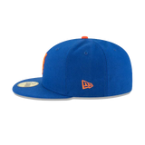 Royal blue fitted cap with flat brim, orange embroidered logo on the side, sports hat style